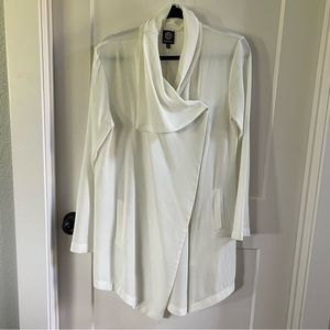 White draped jacket